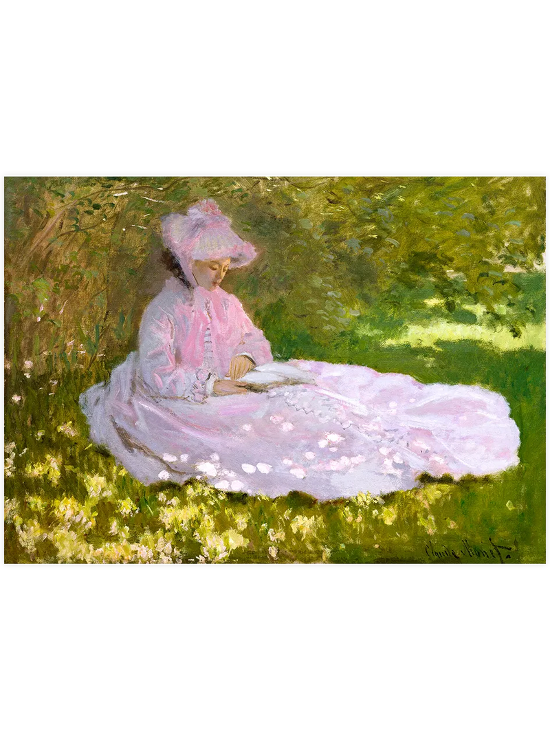 Bahçede kitap okuyan Camille Monet.